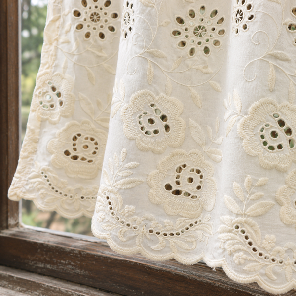 Ivory cutwork floral short curtain — hem view
