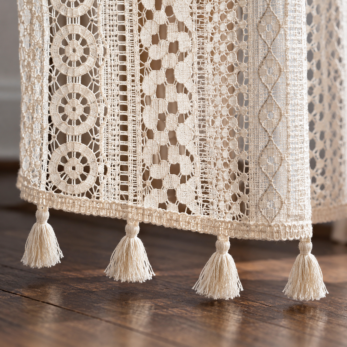 Cream vertical patterned open lace curtain — tassel-detail